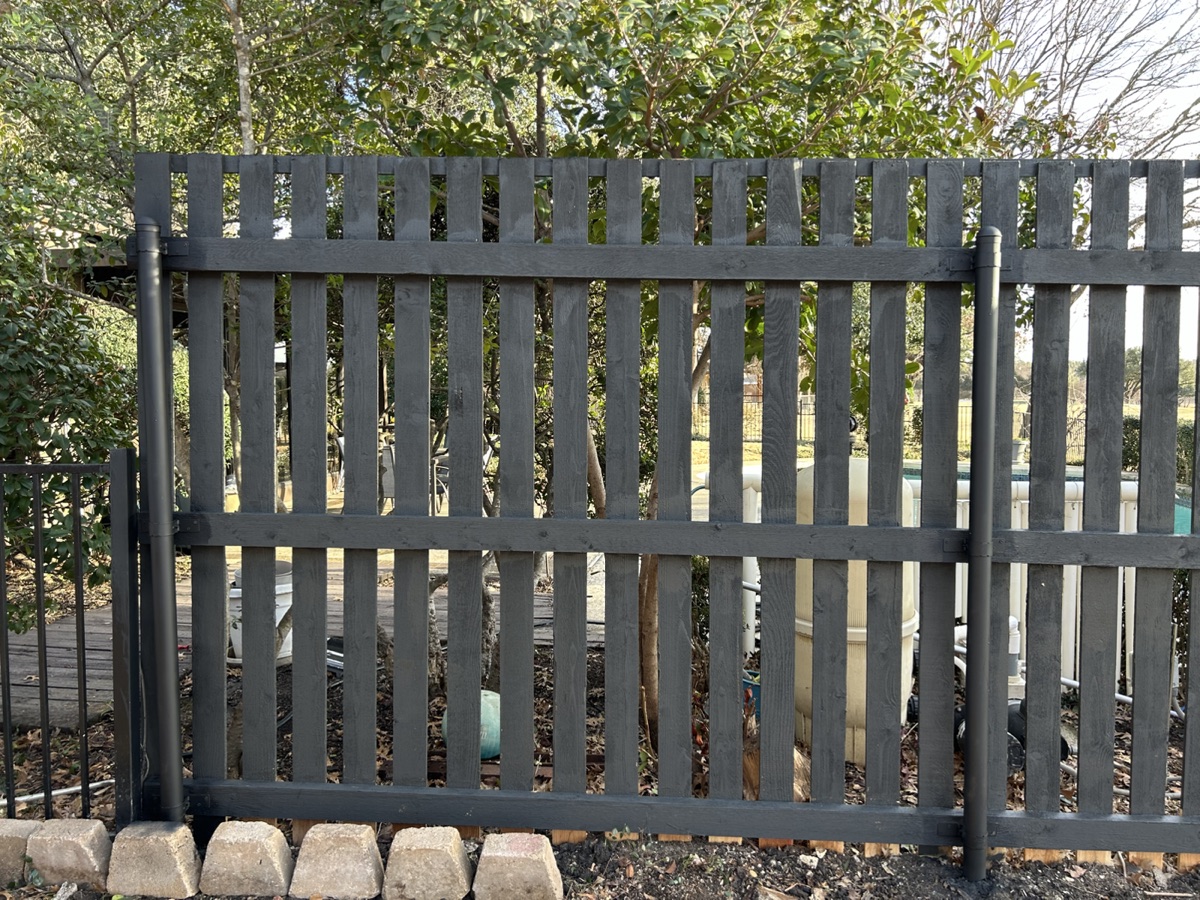 New stained fence and gate section