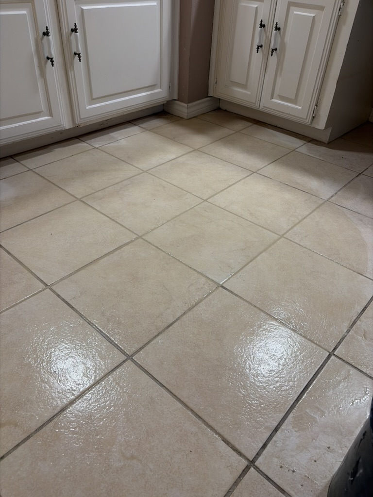 Finished floor tile and grout repair in a home